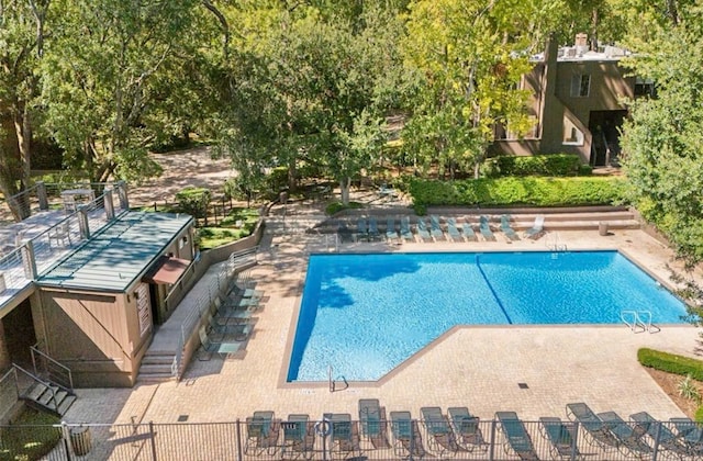 view of pool featuring a patio area