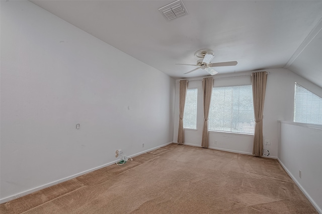 bonus room with light colored carpet, lofted ceiling, and ceiling fan