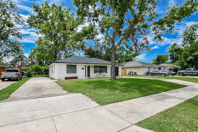 ranch-style home with a front lawn