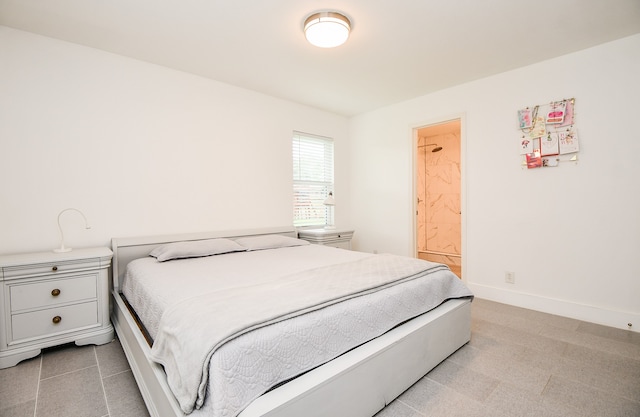 bedroom featuring ensuite bathroom