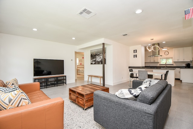 living room featuring sink