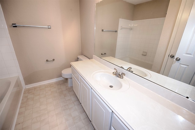 full bathroom featuring vanity, toilet, and tiled shower / bath combo