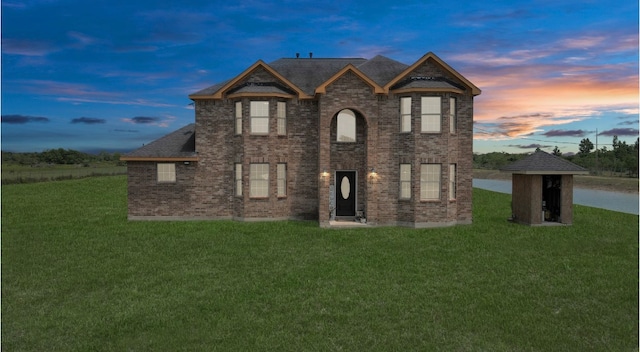 view of front of home featuring a yard