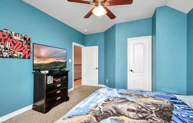 bedroom featuring ceiling fan, lofted ceiling, and carpet floors