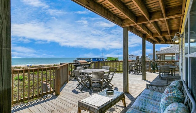 wooden terrace with a water view