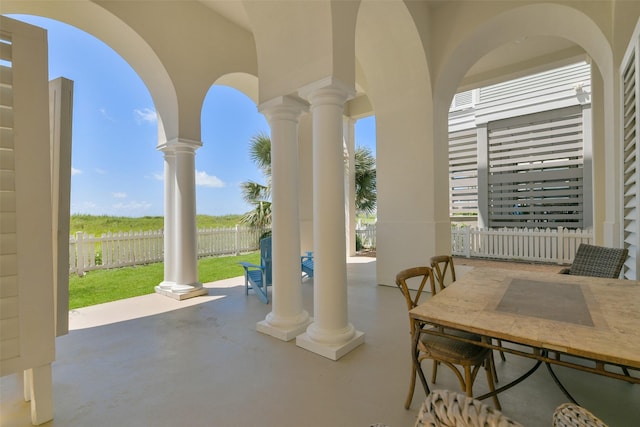 1745 Seaside Dr, Galveston, TX 77550 - view of patio / terrace featuring fence and outdoor dining space