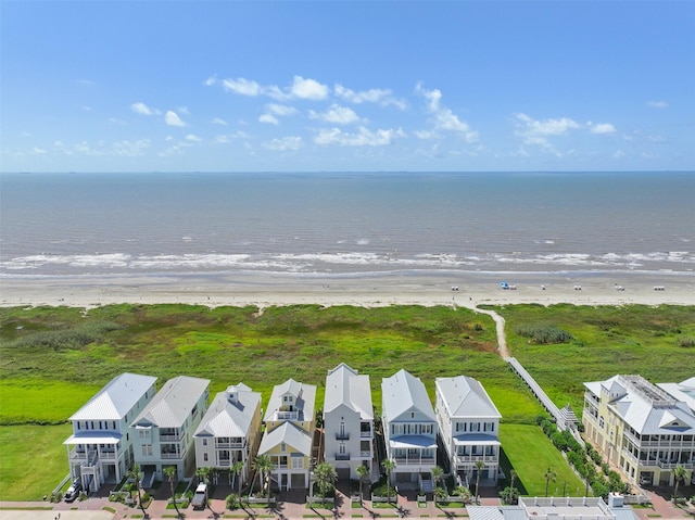 1745 Seaside Dr, Galveston, TX 77550 - bird's eye view featuring a view of the beach, a water view, and a residential view
