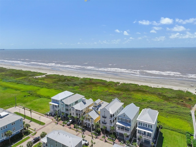 1745 Seaside Dr, Galveston, TX 77550 - drone / aerial view featuring a view of the beach and a water view