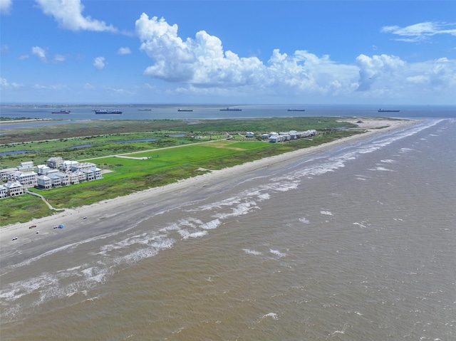 1745 Seaside Dr, Galveston, TX 77550 - aerial view featuring a water view and a beach view