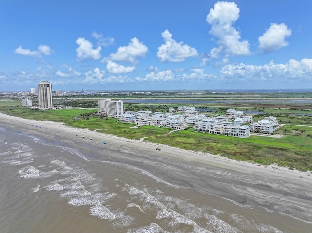 1745 Seaside Dr, Galveston, TX 77550 - birds eye view of property featuring a view of the beach and a water view