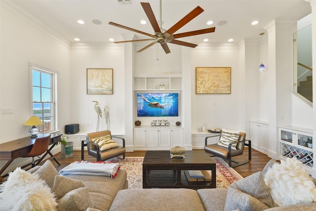 1745 Seaside Dr, Galveston, TX 77550 - living area with a ceiling fan, ornamental molding, recessed lighting, and wood finished floors