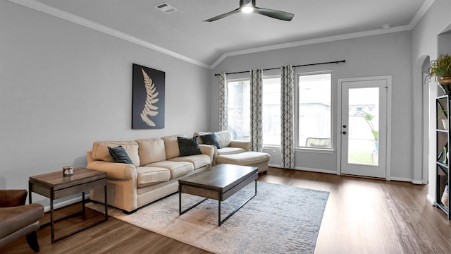 living room featuring crown molding, hardwood / wood-style floors, vaulted ceiling, and ceiling fan