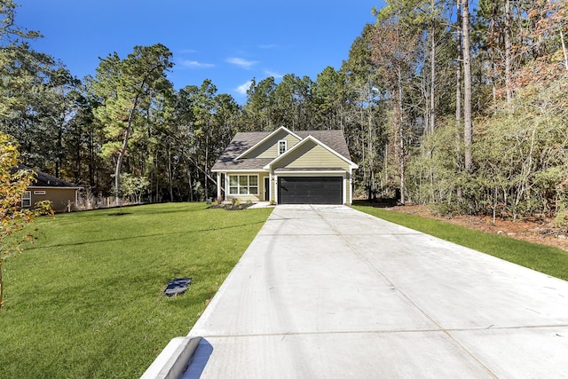 view of front facade featuring a front yard and a garage