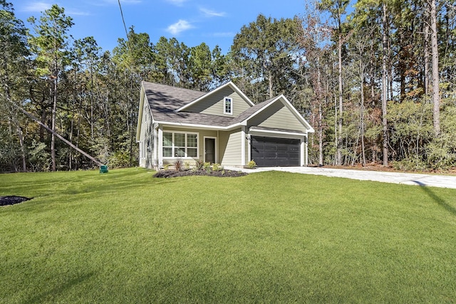 view of front of home featuring a front yard and a garage