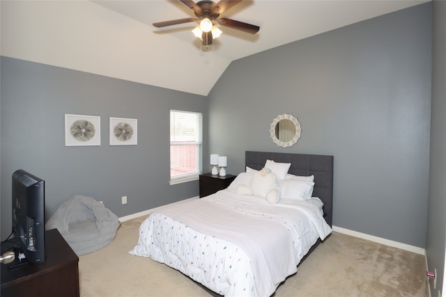 bedroom with carpet flooring, ceiling fan, and vaulted ceiling