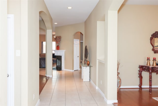 hallway with light tile patterned flooring