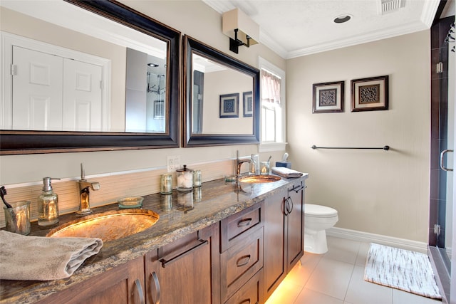 bathroom with an enclosed shower, ornamental molding, vanity, tile patterned flooring, and toilet