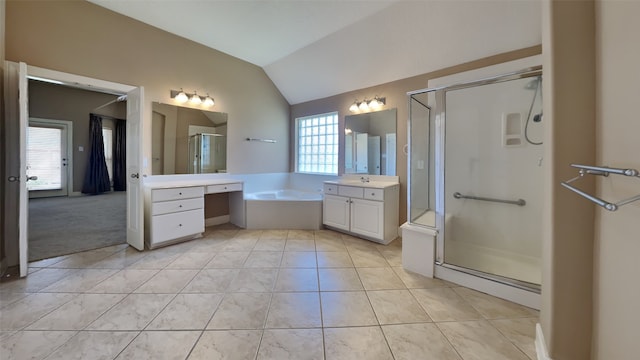 bathroom featuring vanity, a healthy amount of sunlight, lofted ceiling, and shower with separate bathtub