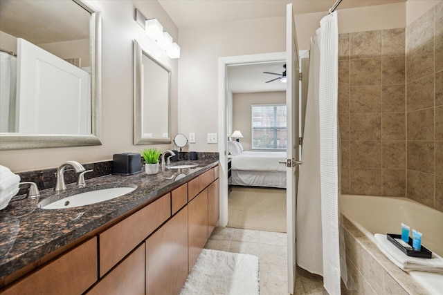 bathroom featuring vanity, ceiling fan, separate shower and tub, and tile patterned flooring