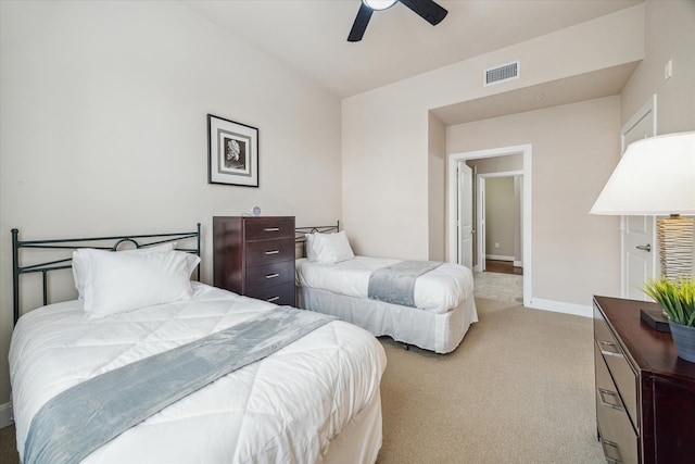 bedroom featuring ceiling fan and light carpet