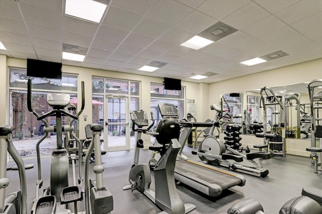 exercise room featuring a paneled ceiling