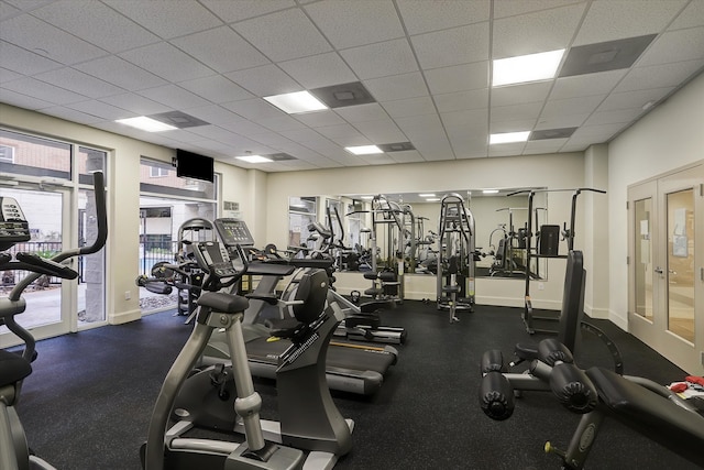 gym with a drop ceiling