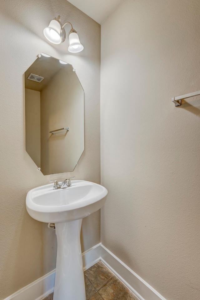 bathroom featuring tile patterned flooring