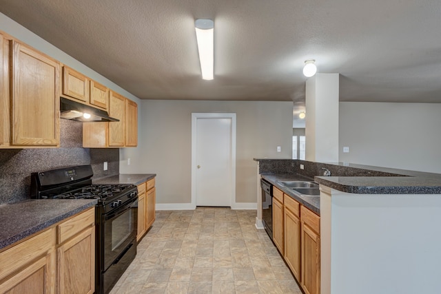 kitchen with light brown cabinets, a textured ceiling, sink, and black appliances