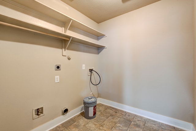 clothes washing area featuring electric dryer hookup, gas dryer hookup, and washer hookup