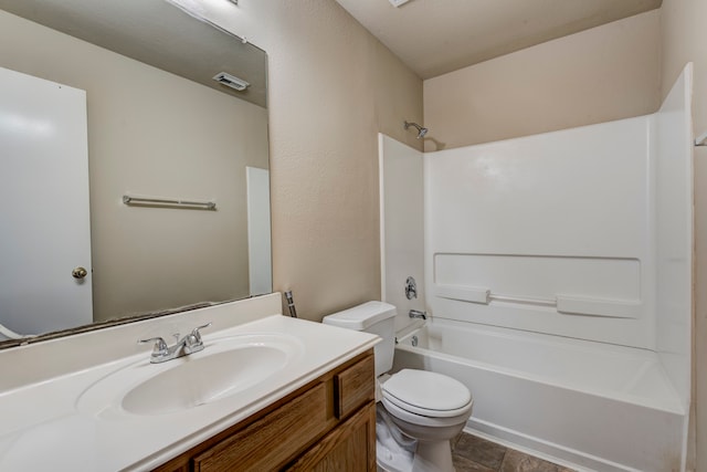 full bathroom featuring shower / bathing tub combination, vanity, and toilet