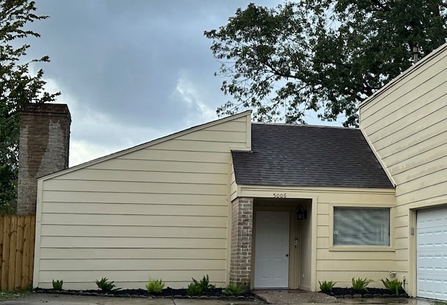 exterior space with a garage