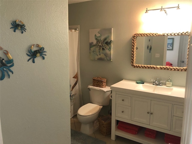 4034 Panola Dr, Galveston, TX 77554 - bathroom with tile patterned flooring, toilet, vanity, and a shower with shower curtain