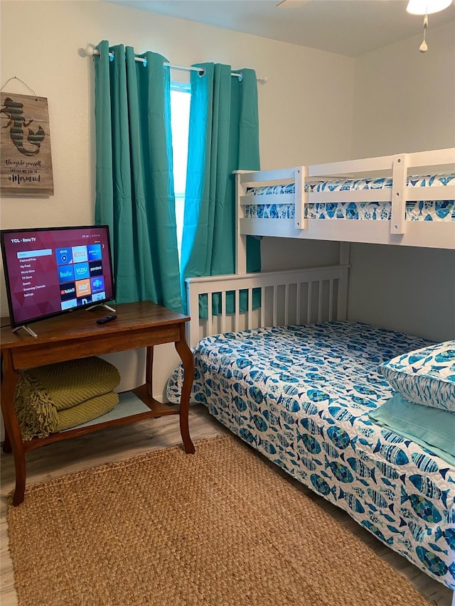 4034 Panola Dr, Galveston, TX 77554 - bedroom featuring wood finished floors
