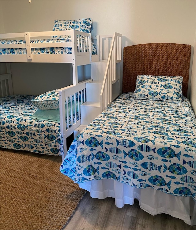 4034 Panola Dr, Galveston, TX 77554 - bedroom with wood finished floors