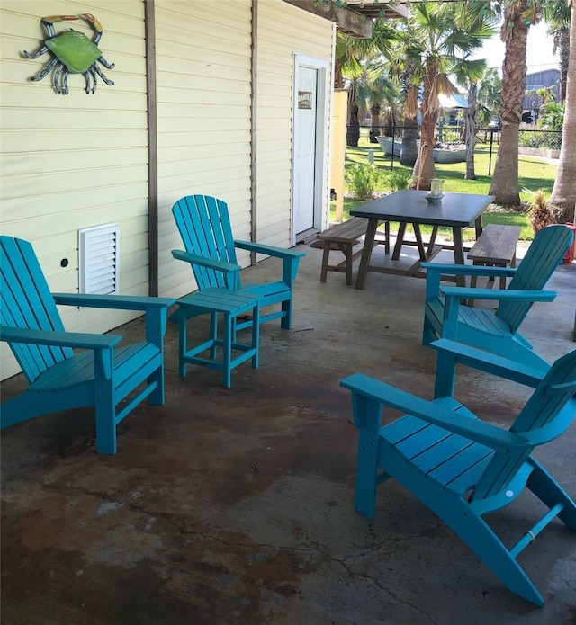 4034 Panola Dr, Galveston, TX 77554 - view of patio with outdoor dining space