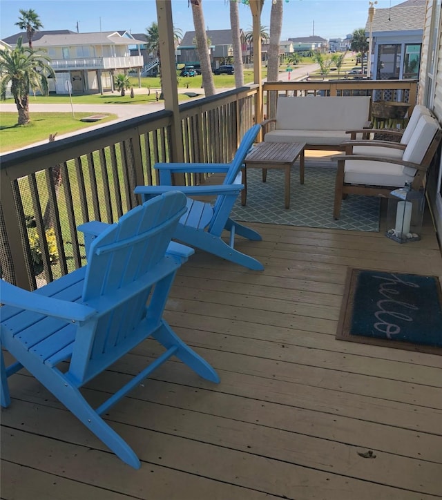 4034 Panola Dr, Galveston, TX 77554 - wooden deck featuring a residential view