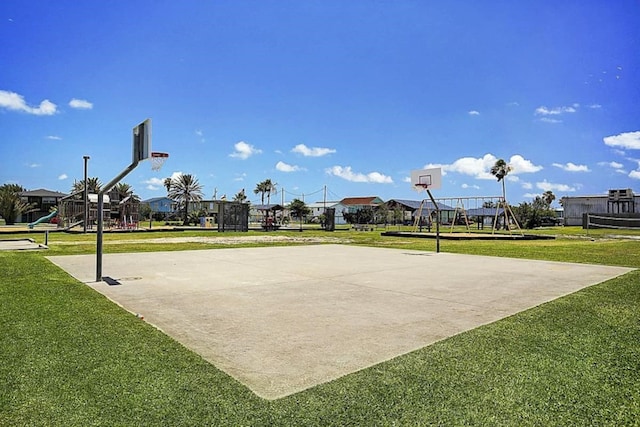 4034 Panola Dr, Galveston, TX 77554 - view of basketball court featuring community basketball court and a yard