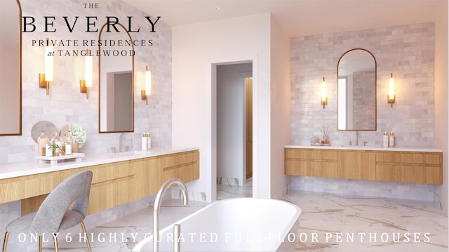 bathroom with a tub, decorative backsplash, and vanity