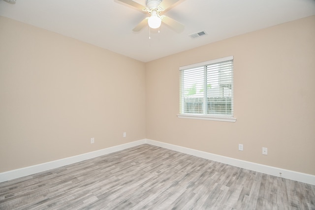 unfurnished room with ceiling fan and light hardwood / wood-style flooring