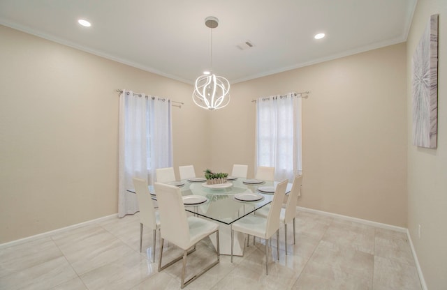 dining area with ornamental molding