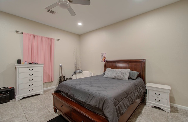 bedroom featuring light tile patterned floors and ceiling fan