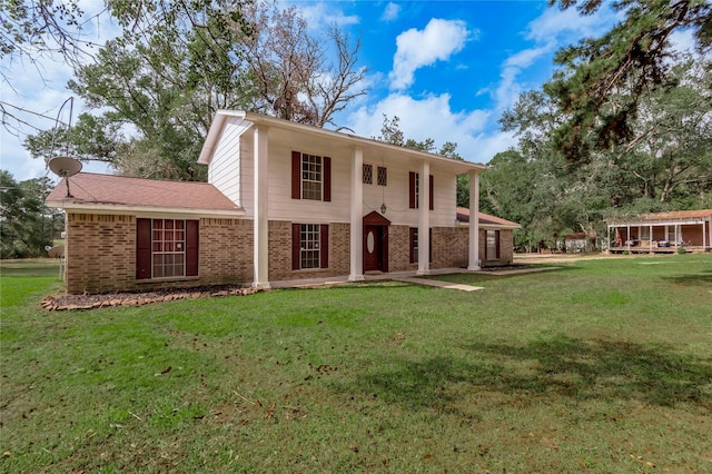 view of front of home with a front lawn