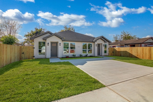 ranch-style home with a front yard