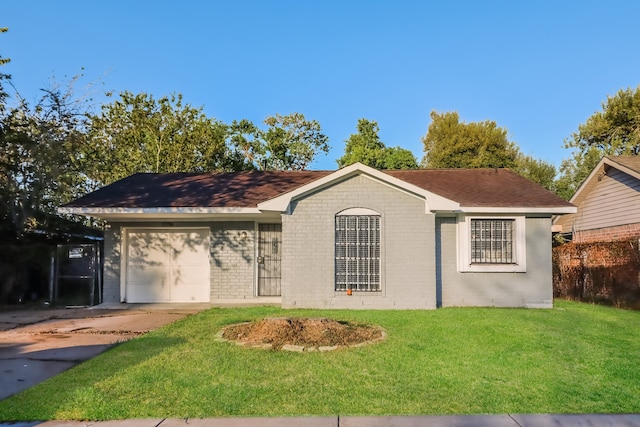 single story home with a front yard and a garage