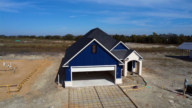 view of front of property featuring a garage