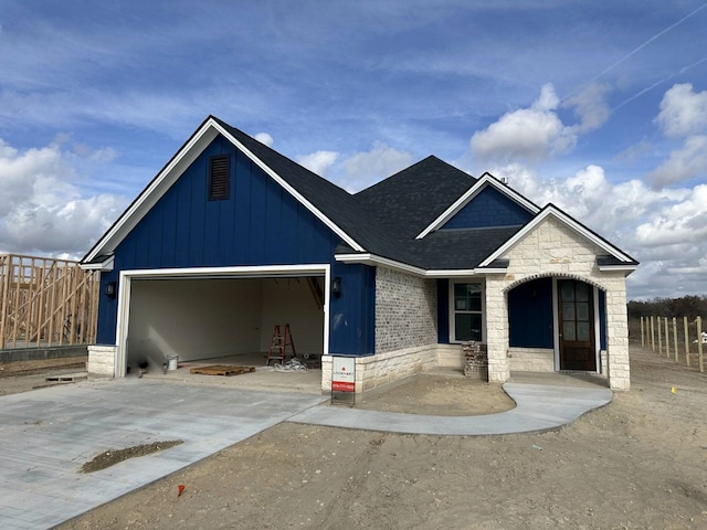 view of front of property featuring a garage