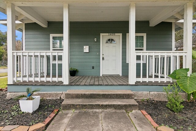 property entrance with a porch