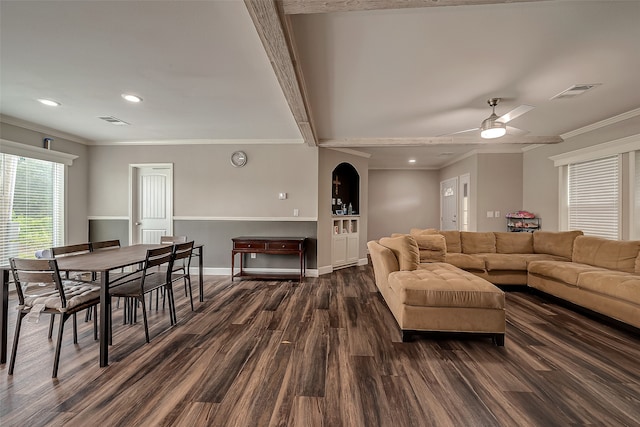 living room featuring ceiling fan, crown molding, and dark hardwood / wood-style floors