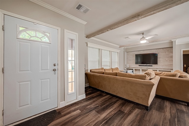 living room with ornamental molding, dark wood-type flooring, and ceiling fan