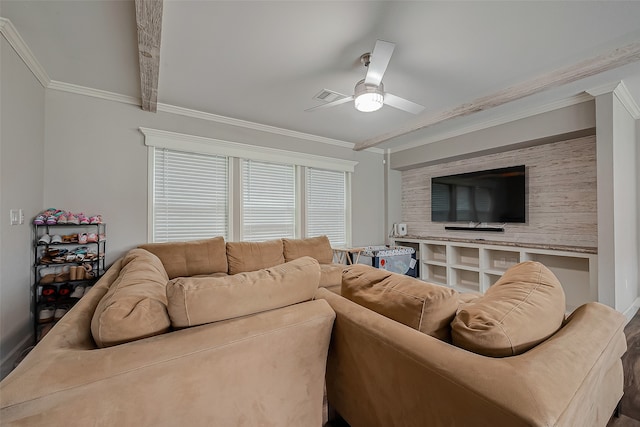 living room featuring ceiling fan, crown molding, and beamed ceiling